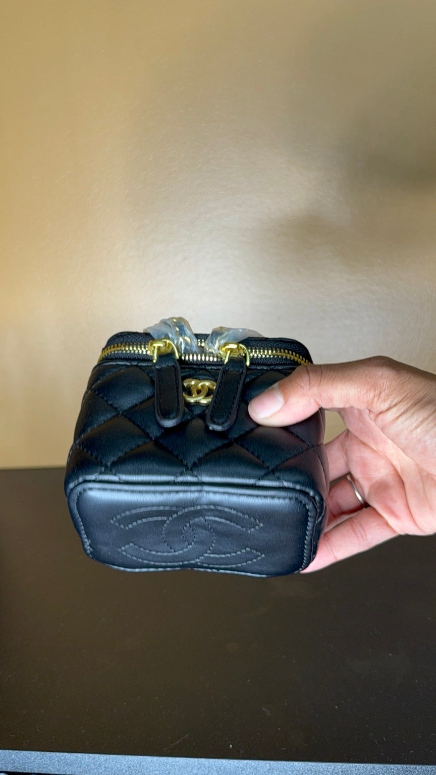 Black Chanel vanity bag bottom view