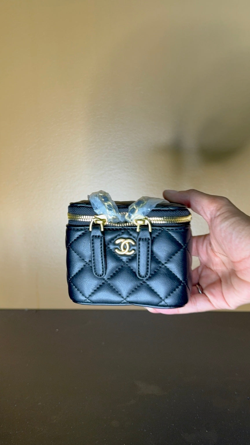 Black Chanel vanity bag front view
