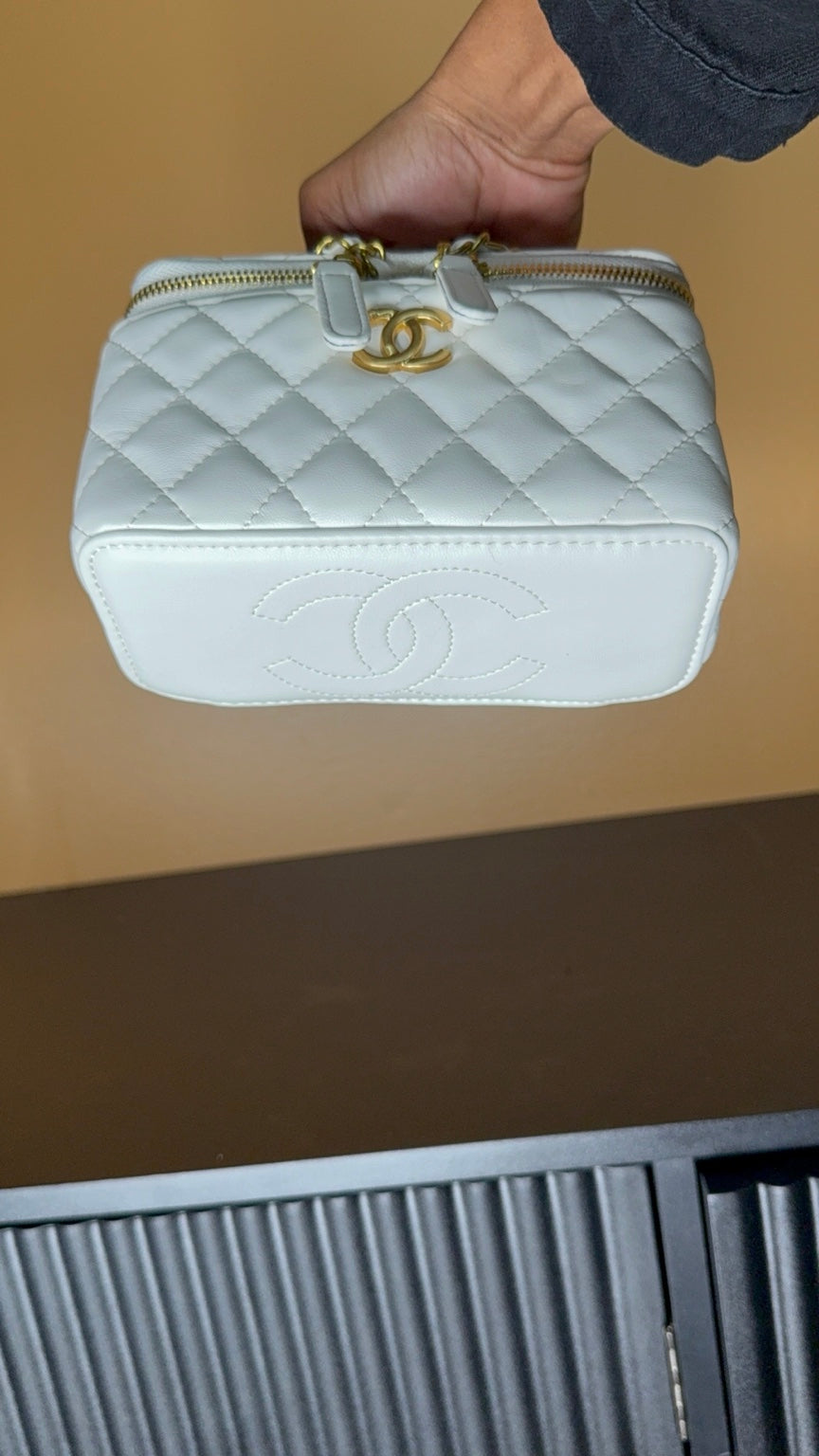White Chanel vanity bag bottom view