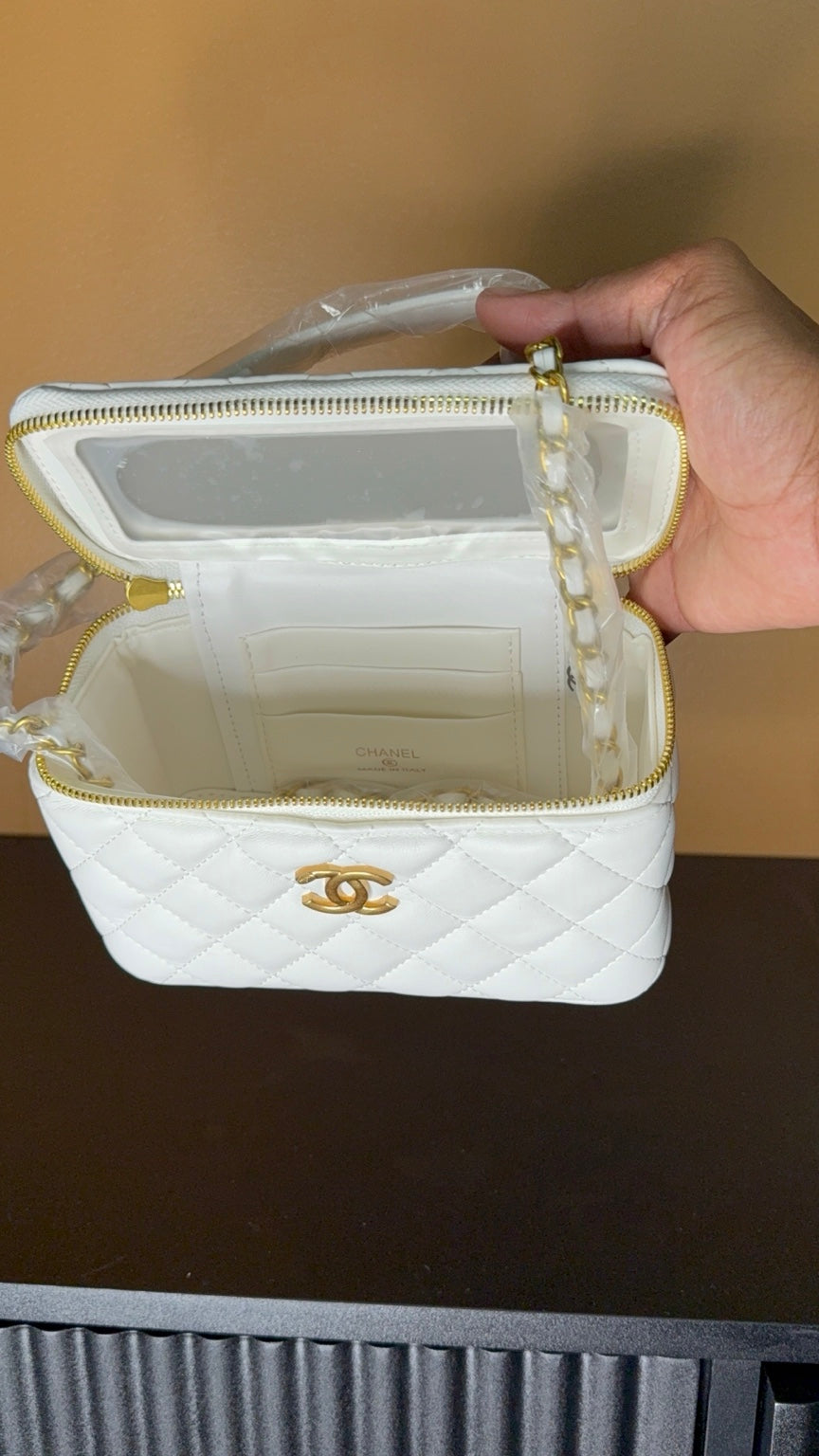 White Chanel vanity bag interior view